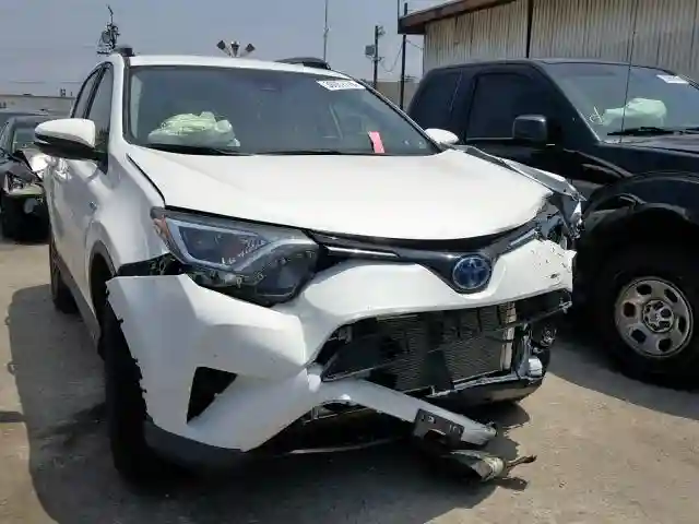 JTMRJREV6JD227765 2018 TOYOTA RAV4 HV LE-0