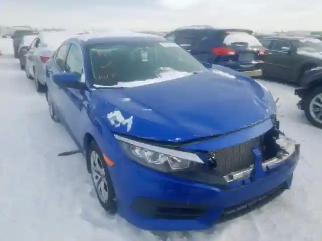 2HGFC2F58JH023606 2018 HONDA CIVIC LX-0