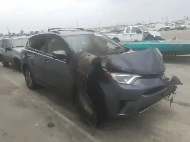 JTMRJREV4JD242121 2018 TOYOTA RAV4 HV LE-0