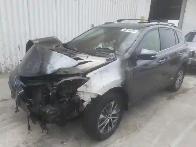 JTMRJREV4JD242121 2018 TOYOTA RAV4 HV LE-1