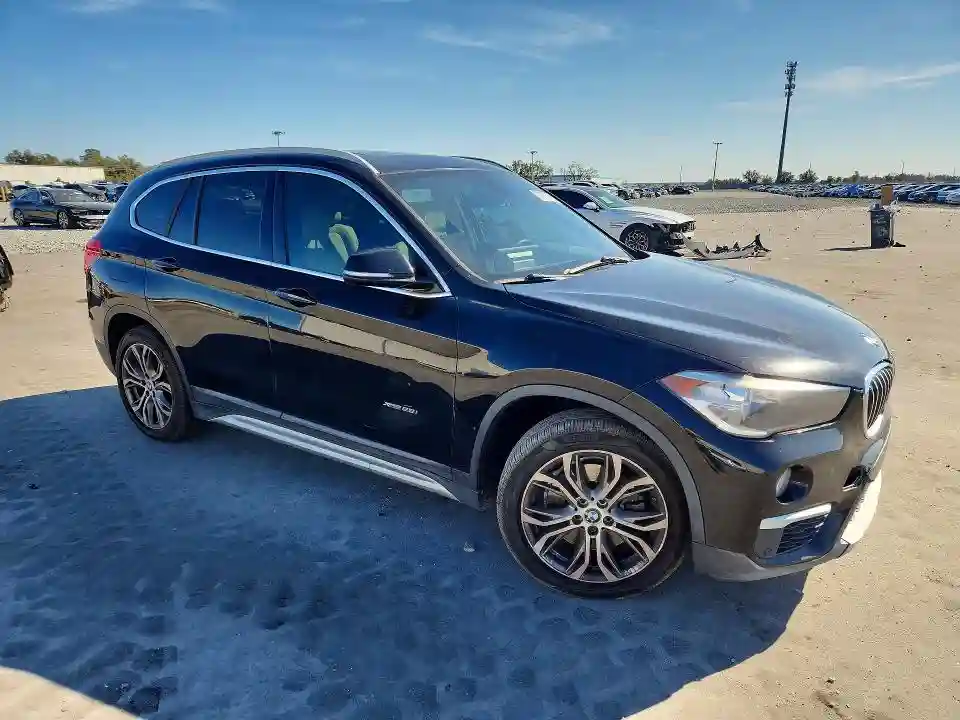 WBXHT3C37H5F87044 2017 BMW X1-3