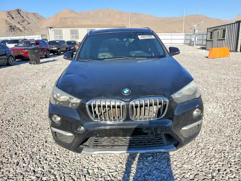WBXHT3C34G5E50335 2016 BMW X1-4
