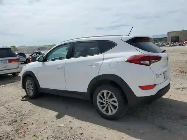 KM8J3CA47GU077297 2016 HYUNDAI TUCSON-1