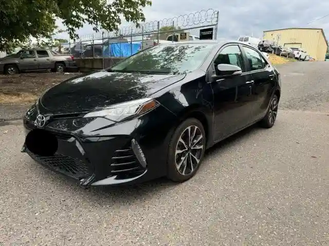 5YFBURHE9JP771050 2018 TOYOTA COROLLA-1