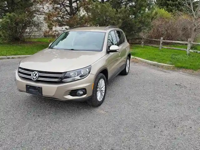 WVGJV7AX8GW052957 2016 VOLKSWAGEN TIGUAN-1
