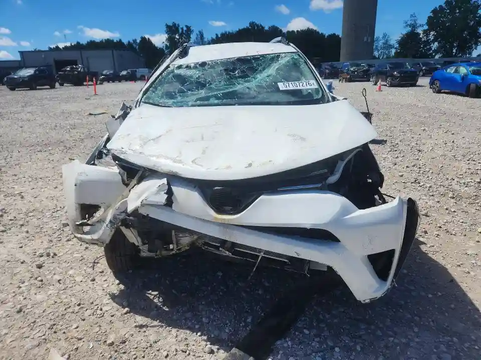 JTMBFREV0GJ083854 2016 TOYOTA RAV4-4