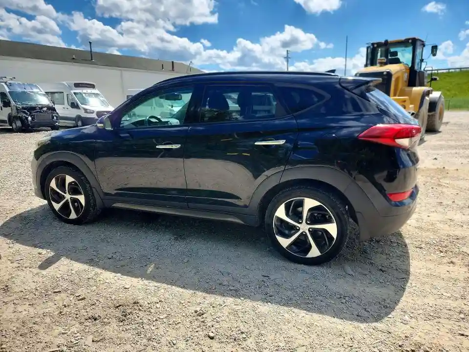 KM8J3CA26GU057802 2016 HYUNDAI TUCSON-1