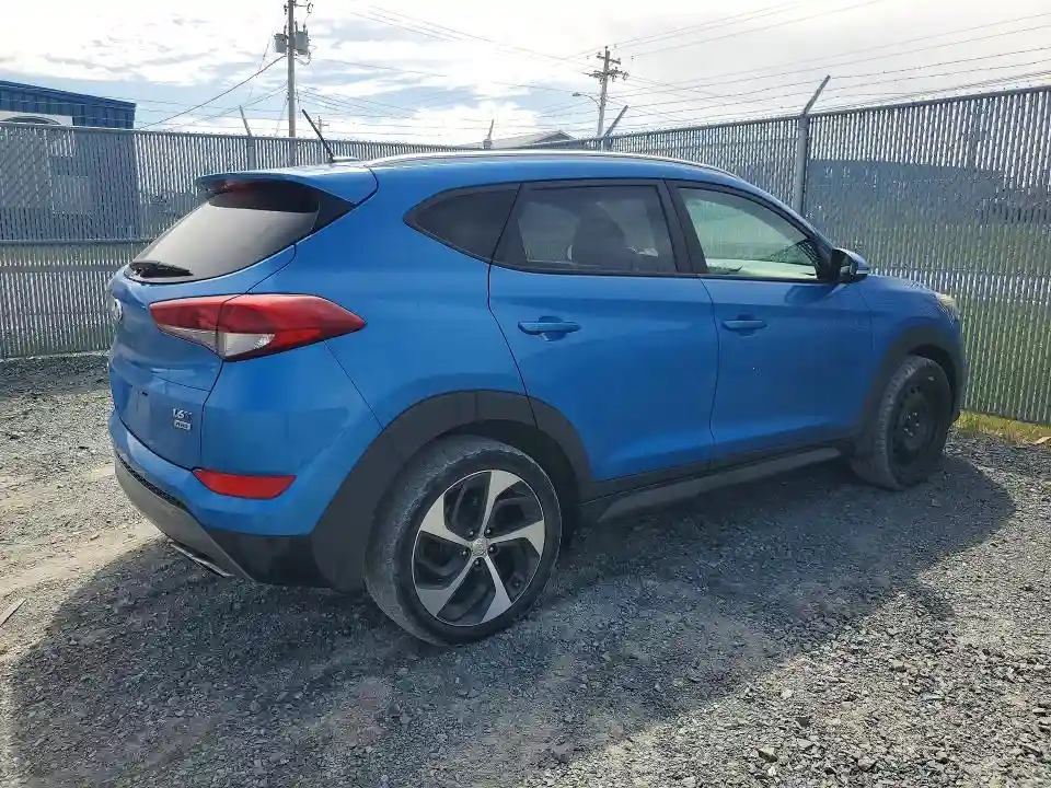 KM8J3CA25GU235540 2016 HYUNDAI TUCSON-2