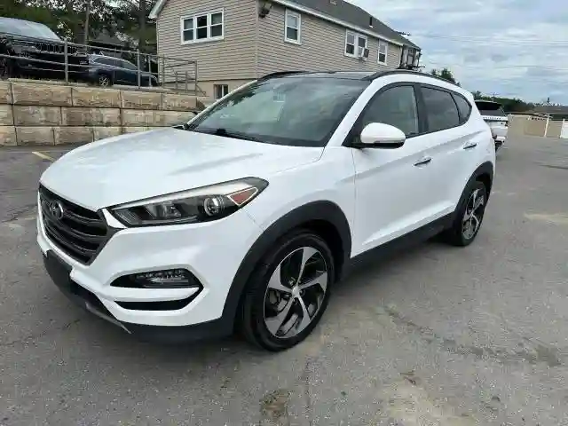 KM8J3CA25GU141190 2016 HYUNDAI TUCSON-0