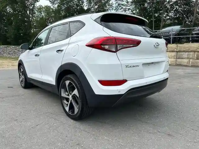 KM8J3CA25GU141190 2016 HYUNDAI TUCSON-1