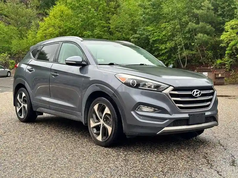 KM8J3CA2XGU194869 2016 HYUNDAI TUCSON-0