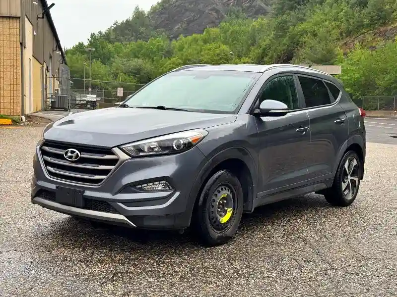 KM8J3CA2XGU194869 2016 HYUNDAI TUCSON-1